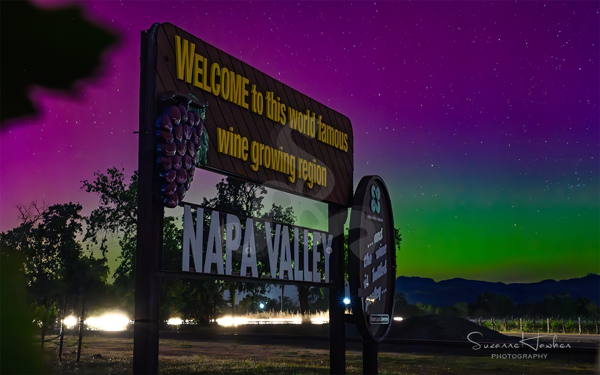 napa photographer Suzanne Hawken Napa Valley Welcome Sign during Aurora Borealis