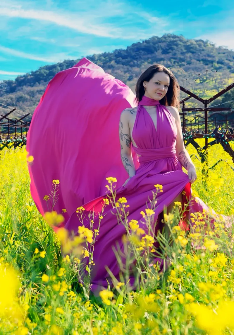 Beautiful young woman wearing a flying dress for a photoshoot in Napa Valley