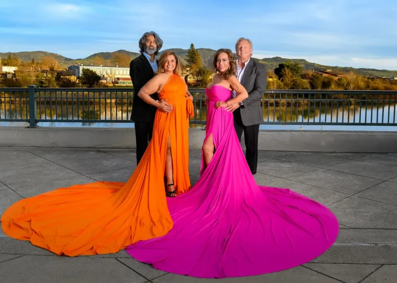 Two couples experiencing the Flying Dress photoshoot in Downtown Napa